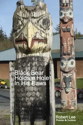 Black Bear Holds a Hole in His Paws